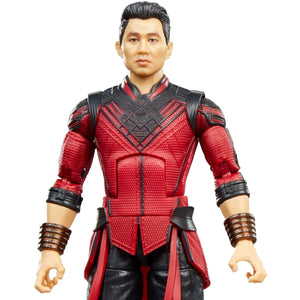 A Marvel Cinematic Universe action figure of Shang-Chi, wearing a textured red and black armored costume with brown arm bracers, set against a plain white background.
